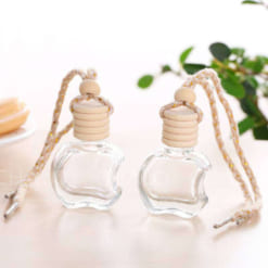 tinh-dau-treo-xe-thuy-tinh-nap-go-hinh-qua-tao-7ml (1)